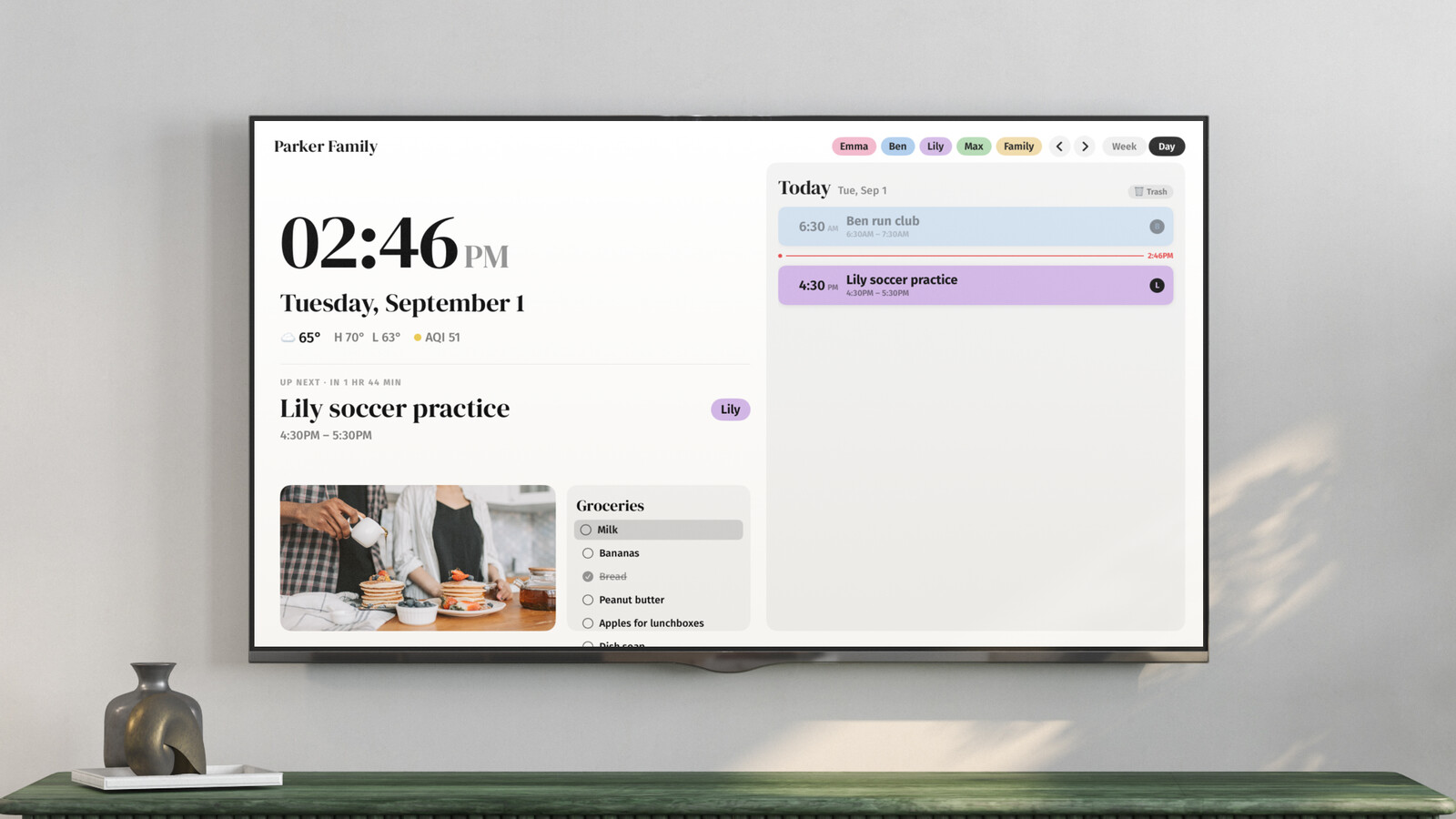 Callie's day view on a living-room TV: every family member's events from iCloud and Google in one schedule, each in its person's color